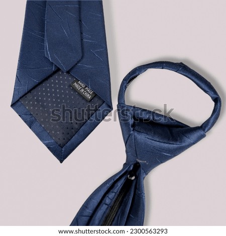 adjustable pre tied necktie top and bottom sides from top angle view, men's fashionable necktie both sides from top view, zipper tie pre tie knot flat lay photography 