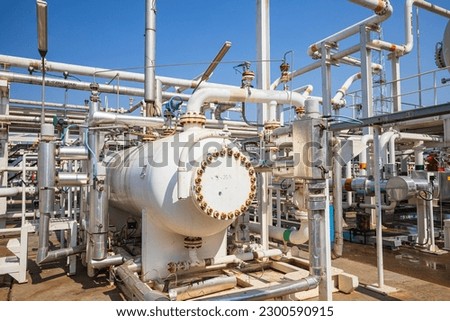 Vessel tank pressure steam gauge valves at plant pressure safety valve station. Royalty-Free Stock Photo #2300590915