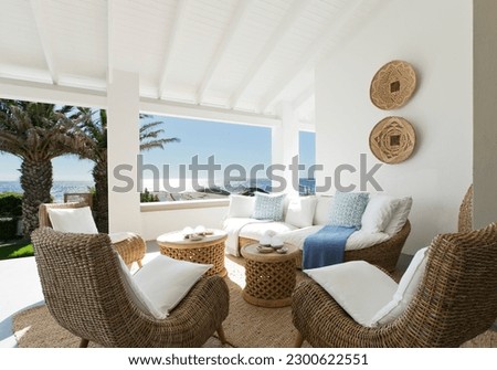 Wicker sofa and chairs on luxury patio