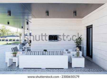 Sofa and television on luxury patio