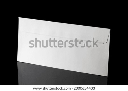 White craft envelope isolated on black background