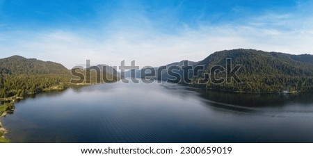 Aerial view on Teletskoye lake in Altai mountains, Siberia, Russia. Drone shot. Beauty summer day. Royalty-Free Stock Photo #2300659019