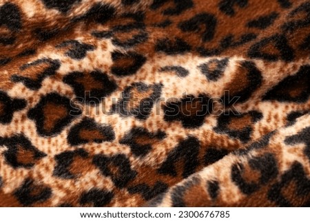 Leopard skin texture for background.