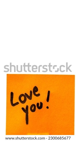 Love you handwriting text close up isolated on orange paper with copy space. Royalty-Free Stock Photo #2300685677