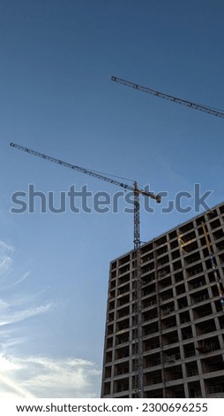 A picture of the process of building residential buildings in Tangier, Morocco.  Building material hoist.