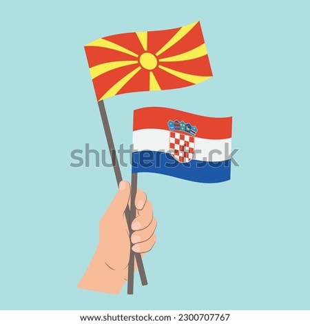 Flags of North Macedonia and Croatia, Hand Holding flags