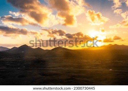 Beautiful sunset over the Volcanos National Park in Lanzarote, Canary Islands, Spain