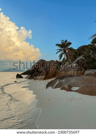 Sunrise at Anse Source d’Argent beach on La Digue island, Seychelles, Indian Ocean Royalty-Free Stock Photo #2300735697