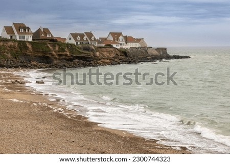 Typical coastal houses at the Cote Opale in Audresselles, France as seen from the Cran du noirda viewpoint.