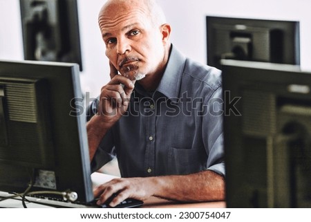 man at computer listens to you skeptically - I am not convinced of what you say, prove it! - among technicians and scientists fortunately the burden of proof is on the person making the claim Royalty-Free Stock Photo #2300754047