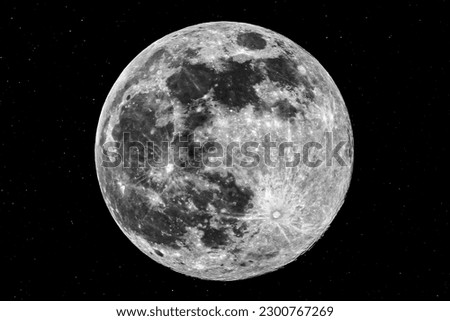 The picture shows the super moon (full moon) with stars over the city of Bottrop in North Rhine-Westphalia with a clear night sky.