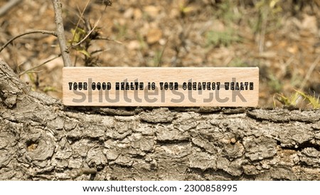 Your good health is your greatest wealth. Written on wooden surface