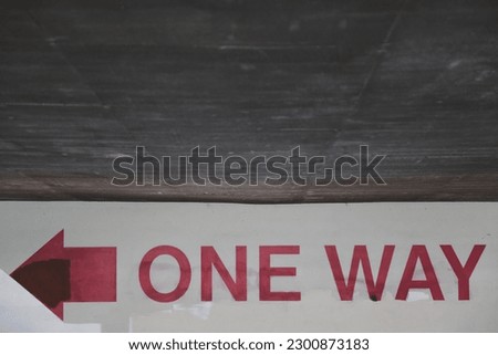 One way sign in a parking garage in downtown Santa Ana CA 