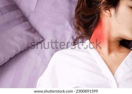 Woman having Neck Pain from Sleeping in an Uncomfortable Bed Posture  Royalty-Free Stock Photo #2300891599