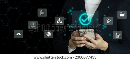Businesswoman using smartphone access and connecting virtual digital file folder data cloud download and upload. Technology and business concept