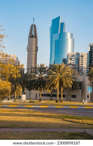 a beautiful picture of dubai city park with buildings and hotels under a blue sky