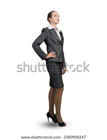 Young attractive businesswoman. Full length portrait on a white background