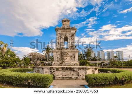 Mactan Shrine, aka Liberty Shrine, a memorial park on Mactan in Lapu Lapu City, Cebu, Philippines. Translation: "Spanish Glories" Royalty-Free Stock Photo #2300917863
