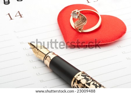 Fountain pen,  calendar page and ring. Valentines day card.