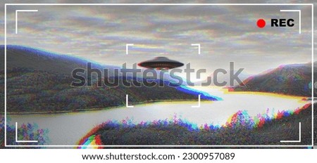 UFO, alien and camcorder viewfinder with a spaceship flying in the sky over area 51 for an invasion. Camera, spacecraft and conspiracy theory with a saucer on a display to record a sighting of aliens Royalty-Free Stock Photo #2300957089