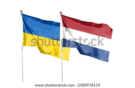 Flags of Netherlands flag and Ukrainian flag. waving in the blue sky