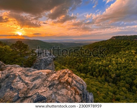 A scenic shot of Hawksbill Crag(Whitaker Point) in Newton County, Arkansas at pinky sunset Royalty-Free Stock Photo #2300978959