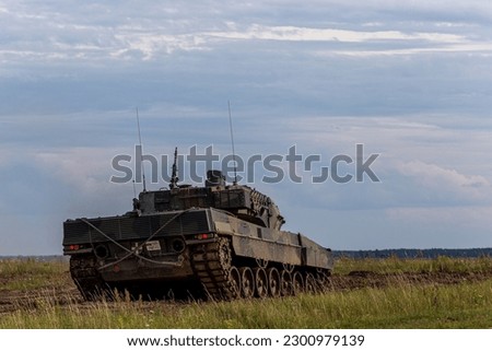 The photo shows a Leopard 2 tank, which has been deployed by the Ukrainian military to bolster their armored capabilities in the ongoing conflict, and is a formidable force on the battlefield Royalty-Free Stock Photo #2300979139
