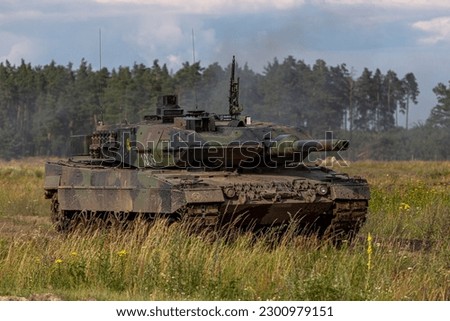 The photo shows a Leopard 2 tank, which has been deployed by the Ukrainian military to bolster their armored capabilities in the ongoing conflict, and is a formidable force on the battlefield Royalty-Free Stock Photo #2300979151