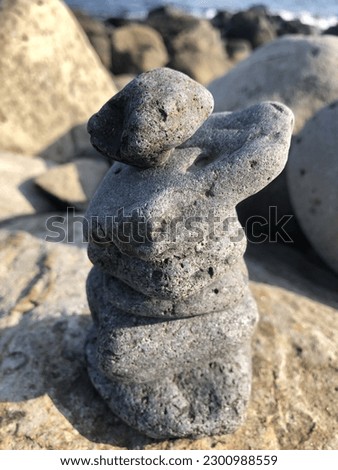 pile of stones on the beach. the natural beauty of the ocean with shooting in the evening