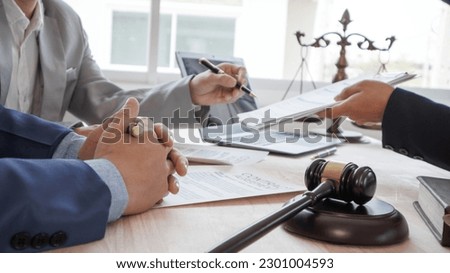 Hard work of Asian lawyers in a lawyer's office . Advise and prosecute conflicts between private and government officials to find a fair settlement.