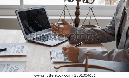Hard work of Asian lawyers in a lawyer's office . Advise and prosecute conflicts between private and government officials to find a fair settlement.