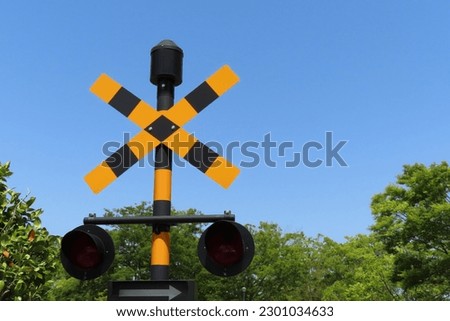 this  is  blue  sky  and  stop  signal  sign.  from  train  station.
