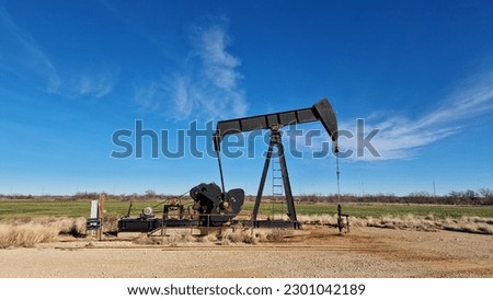 Oil pump jack working, Texas, USA