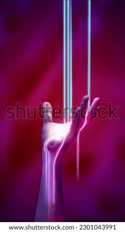 Portrait with neon rays, light shining through the human hand over abstract minimal pink background in neon light. Concept of ultraviolet light, fashion, virtual reality, modern technologies, ad