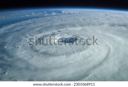 Super Typhoon, tropical storm, cyclone, hurricane, tornado, over ocean. Weather background. Typhoon,  storm, windstorm, superstorm, gale moves to the ground.  Elements of this image furnished by NASA. Royalty-Free Stock Photo #2301068911