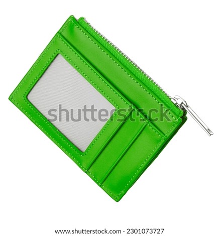Modern business card wallet made of genuine leather in bright green color, with a zipper, with a transparent window, isolated on a white background.