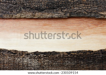 wood with color gradation in an old wooden frame cracked