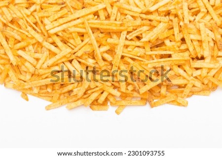 Potato flavored chip sticks on white Royalty-Free Stock Photo #2301093755