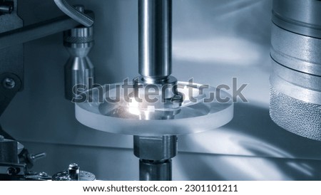 Lens manufacturing in modern laboratory. Royalty-Free Stock Photo #2301101211
