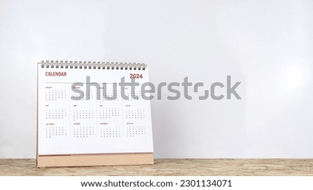 Calendar year 2024 schedule on wood table white background.
2024 calendar planning appointment meeting concept. copy space.