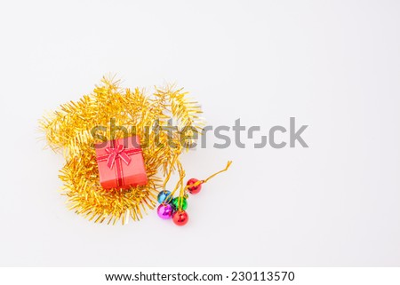 Christmas composition with gift box and decorations on white paper background. 