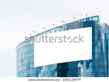 Mock up white large LED display  billboard on tower building .clipping path for mockup Royalty-Free Stock Photo #2301138979