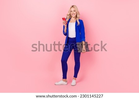 Full size photo of business lady hold netbook smartphone gadget social network smart casual outfit isolated pink color background