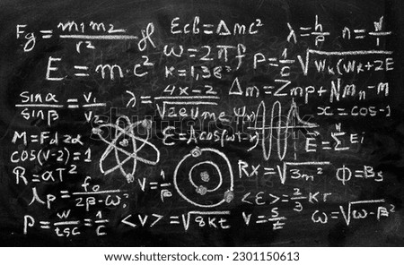 Operations and formulas of quantum physics handwritten with a chalk on the blackboard Royalty-Free Stock Photo #2301150613