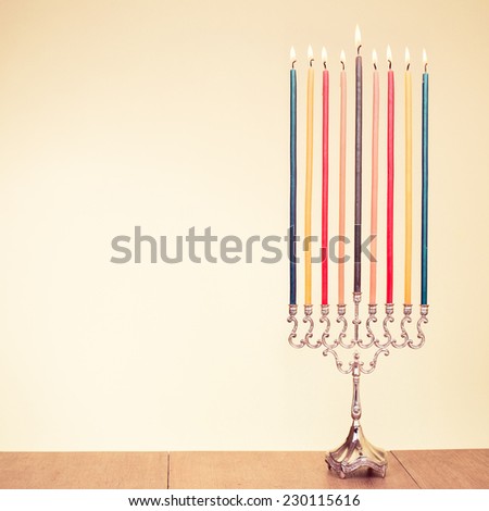 Hanukkah menorah with candles for holiday greeting card background