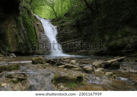 Waterfall in the forest.Beautiful landscape of the waterfall of Tatlica Erfelek district, Sinop, in the Black Sea Region of Turkey. long exposure shooting.
