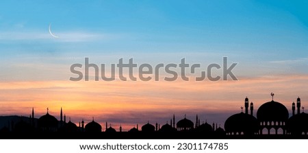 Islamic card with Mosques dome,Crescent moon on Sunset sky,  Ramadan Night with twilight dusk sky for Islamic religion,Eid al-Adha,Eid Mubarak,Eid al fitr,Ramadan Kareem,Islamic new year Muharram Royalty-Free Stock Photo #2301174785