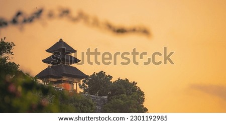 Uluwatu Temple at sunset. Bali. Indonesia. High quality photo Royalty-Free Stock Photo #2301192985