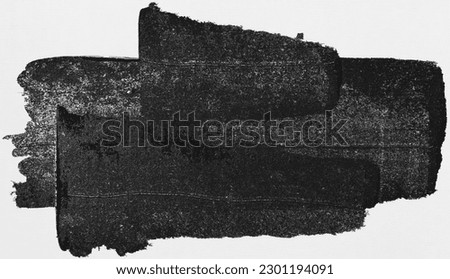 photo of wet dark lino ink remain, black linocutting paint roller texture isolated on white paper background. Royalty-Free Stock Photo #2301194091