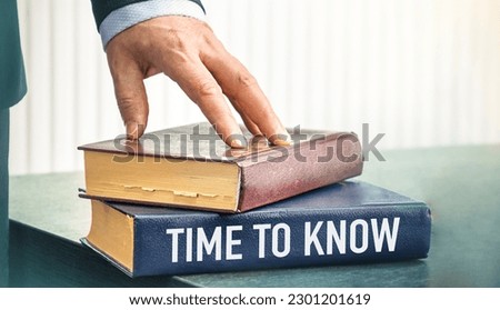 Notepad with text Time To Know on book, near hand Businessman and office supplies. Business concept.